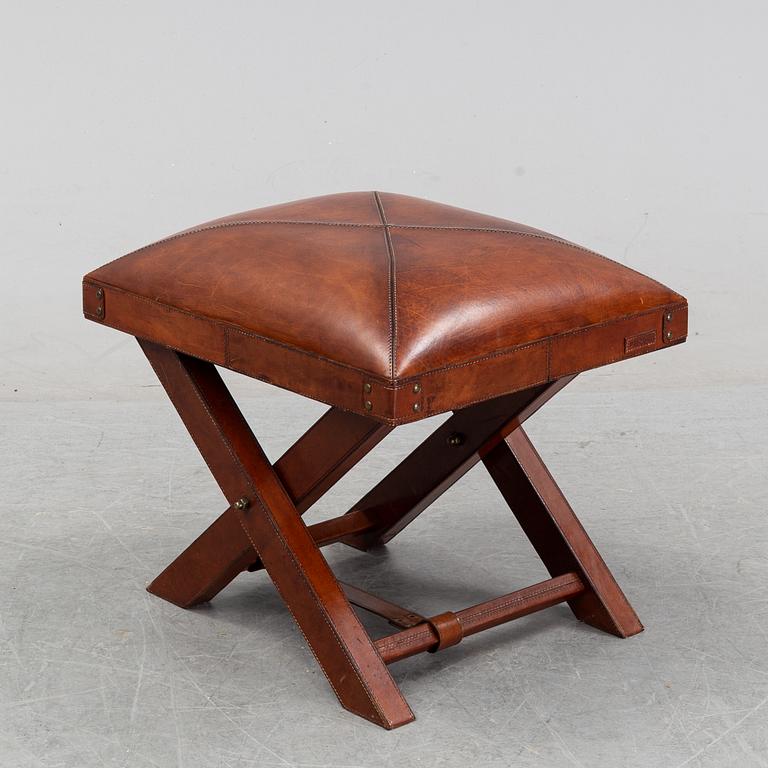 A contemporary dressing table with stool.