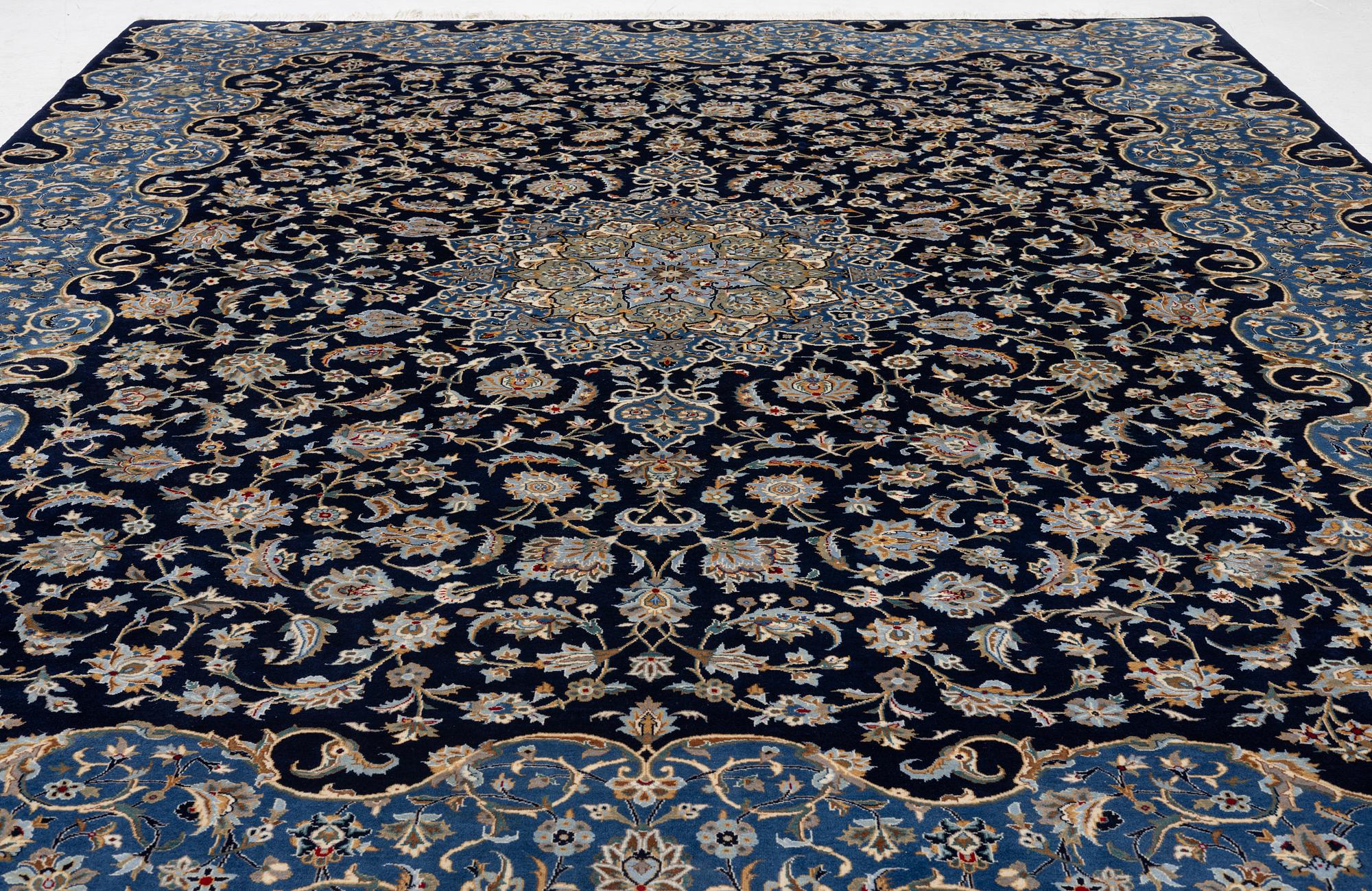 A Royal Keshan carpet, signed, c. 395 x 295 cm.