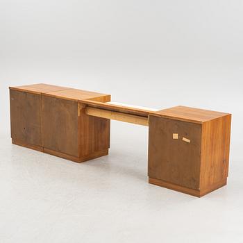 A mahogany, walnut and rosewood veneer set of cabinets with desk, Jönköping Möbelfabriks Aktiebolag. 1950's.