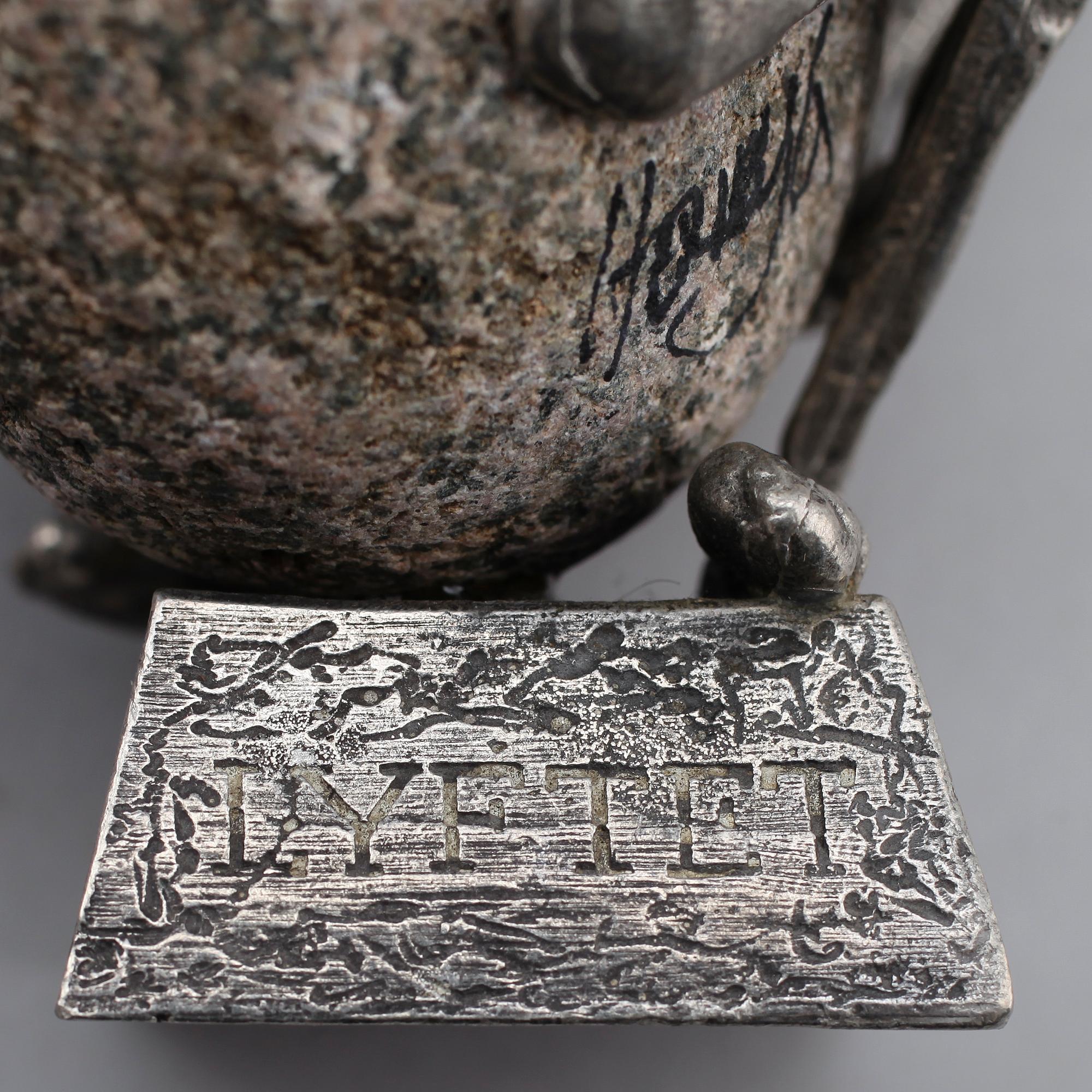 HENRY GUSTAFSSON, skulptur, "Lyftet", tenn och sten, 1989.