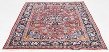 An oriental carpet, approx. 170 x 100 cm.