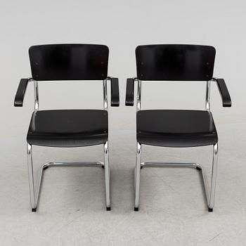 MART STAM, a pair of 'S 43 F' tubular steel armchairs from Thonet, circa 2000.