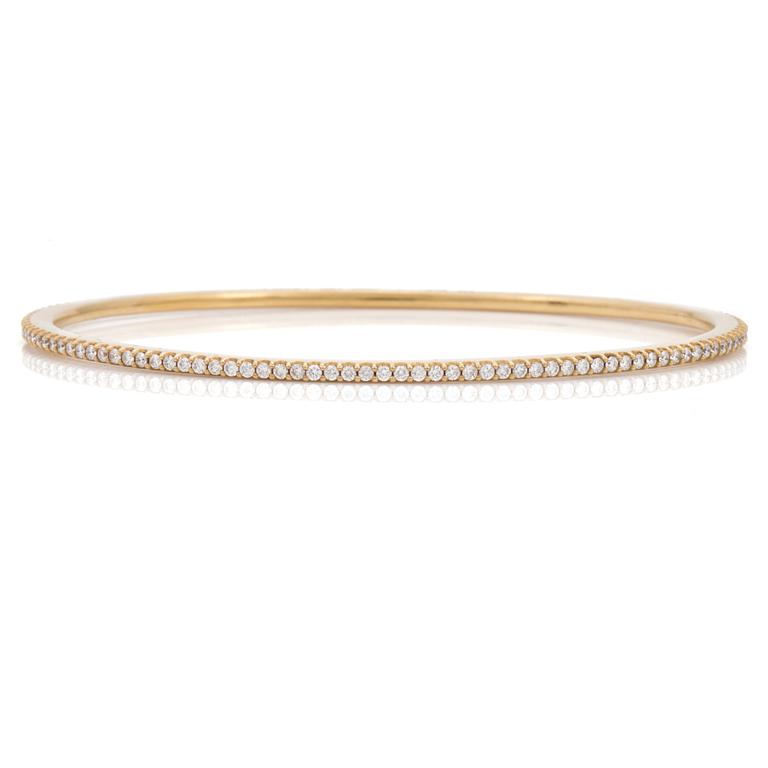 A brilliant cut diamond "Love bracelet" bangle by Ole Lynggard.