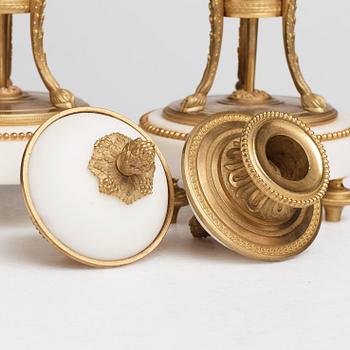 A pair of Louis XVI-style candlesticks, circa 1900.