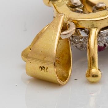 PENSANT 18k gold, brilliant-cut diamonds, 2 rubies and enamel, approx 4 x 3 cm.