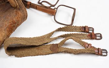 A leather saddle of Caucasian type, dated 1821.