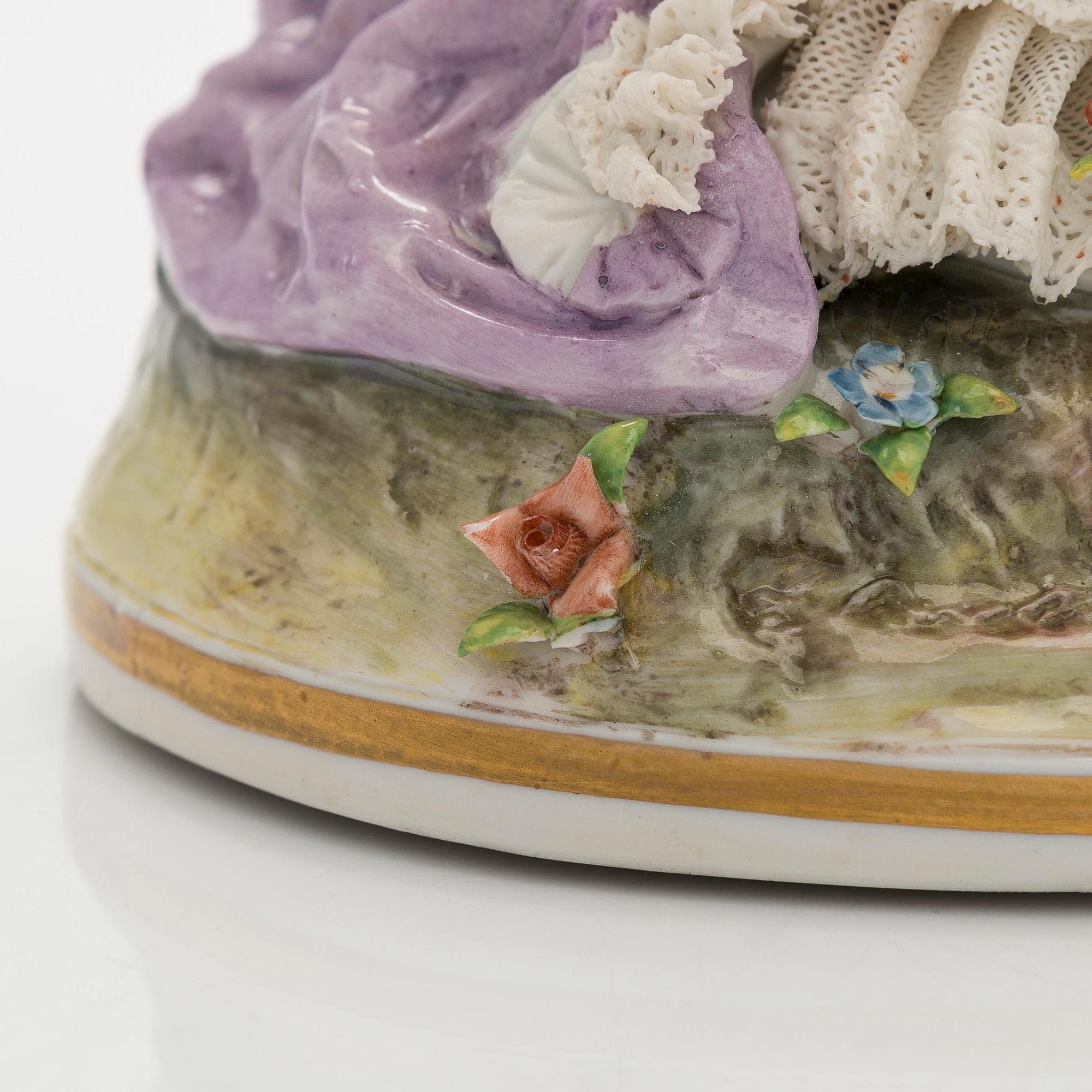 A porcelain lace figurine, Naples style mark, the 20th century.