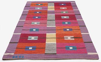 Agda Österberg, a flat weave and tapestry weave carpet, c. 330 x 123 cm, signed AÖ.