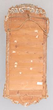A Swedish Rococo mirror dated 1771.