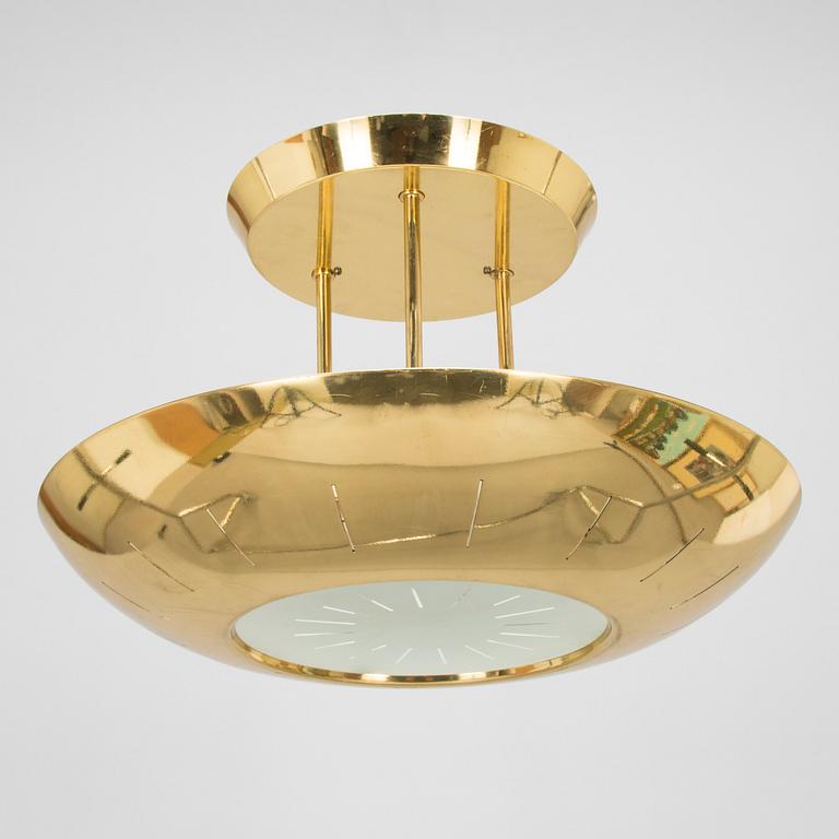 A 1980s brass ceiling light.