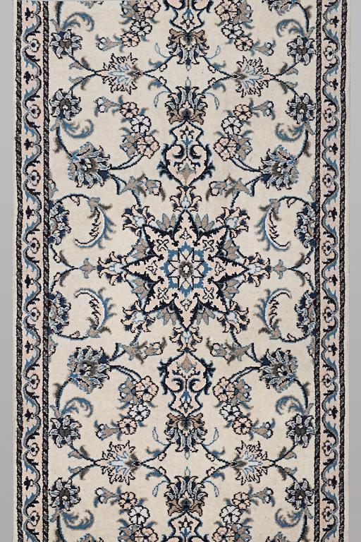 A runner carpet, Nain, part silk, ca 289 x 79 cm.