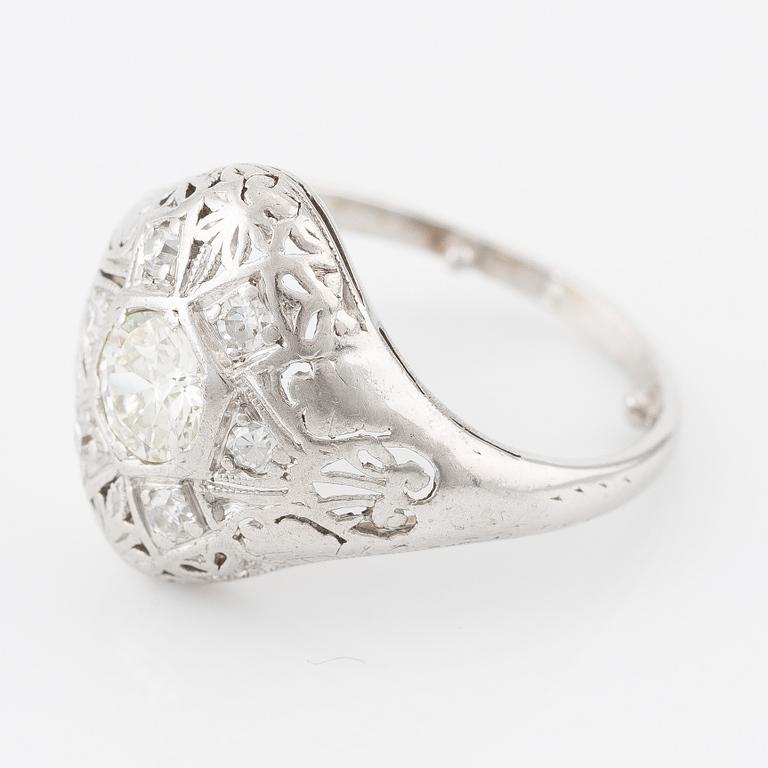 Ring with brilliant-cut diamond and octagon-cut diamonds.