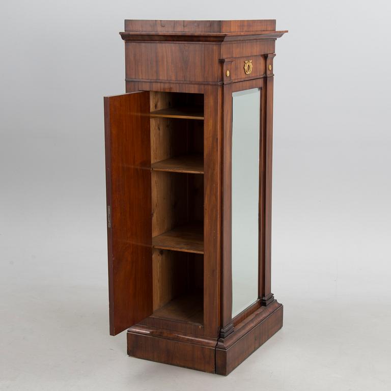 A RUSSIAN DRESSING CUPBOARD, early 19th century.