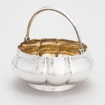 A silver swing handle sugar bowl, maker's mark of Nikolay Kemper, Saint Petersburg, Russia 1892-1908.