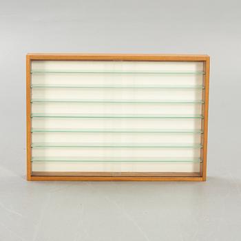 Glass display cabinet, second half of the 20th century.