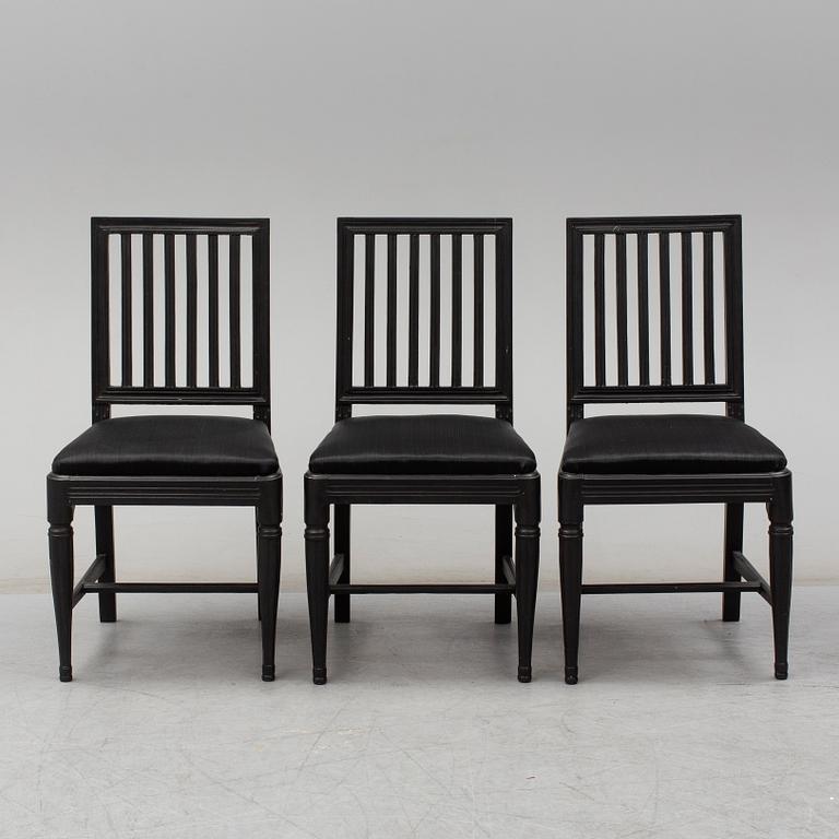 a set of three gustavian chairs.