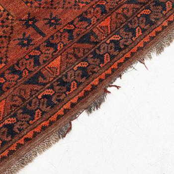 A carpet, semi-antique Afghan, approximately 300 x 221 cm.