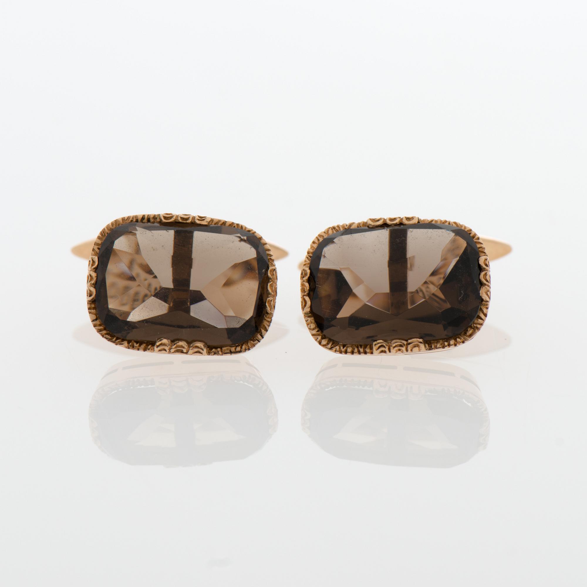 A PAIR OF CUFFLINKS, smoky quartz, 14K gold. Lindroos, Helsinki 1936.