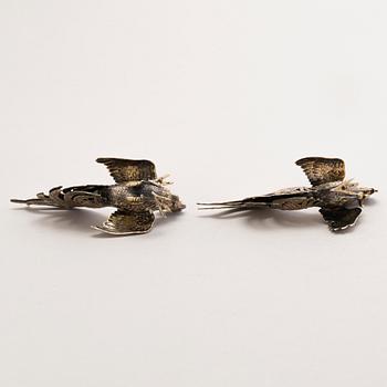 Four silver bird table decorations, Spanish and Finnish hallmarks, 20th Century.