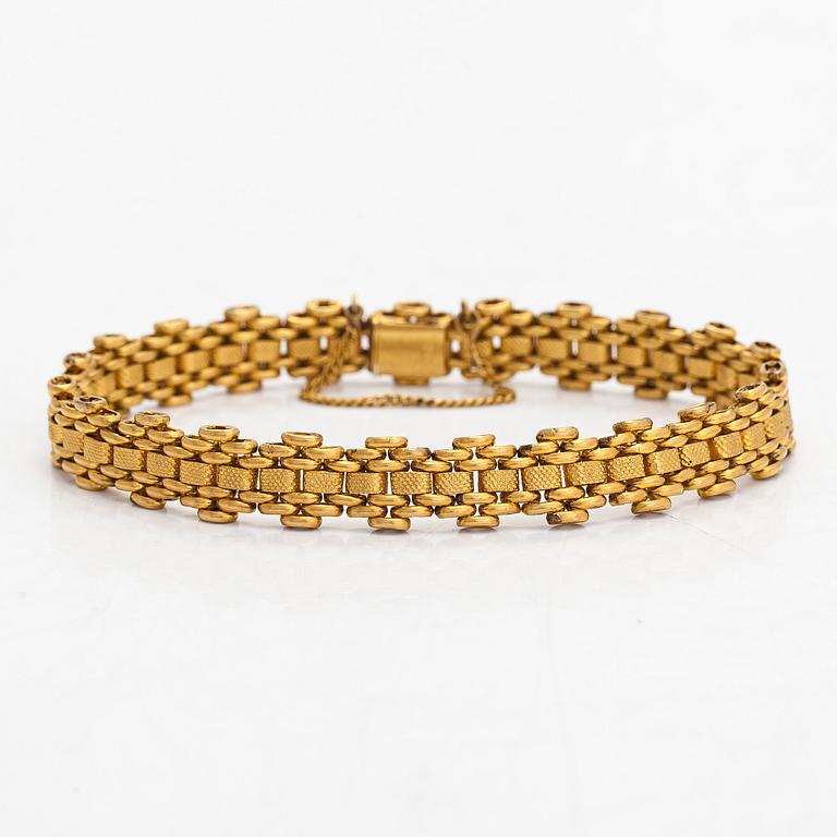A 14K gold bracelet, Moscow, Russia.