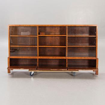 A Swedish Modern 1940s mahogany book cupboard.