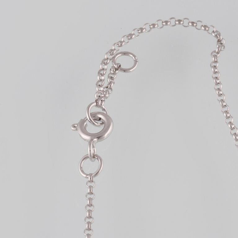 ARMBAND, 18K vitguld med briljantslipade diamanter ca 0.20 ct. Vikt 1,6 gram.