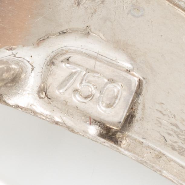 Brooch 18K white gold with two octagon-cut diamonds.