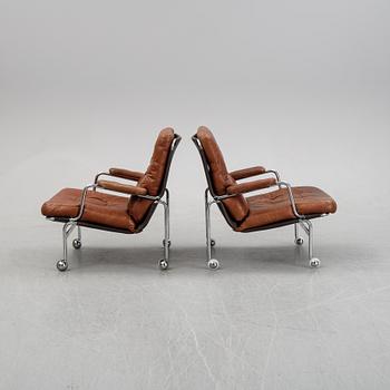 A pair of 'Karin' easy chairs by Bruno Mathsson for Dux, designed 1969.
