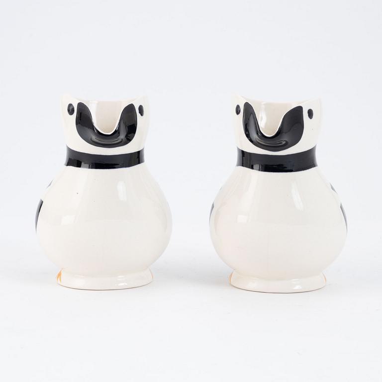 A pair of creamware ewers, "Alkemugge", Egersunds Fayancefabrik, Norway, designed 1910, produced around 1930.