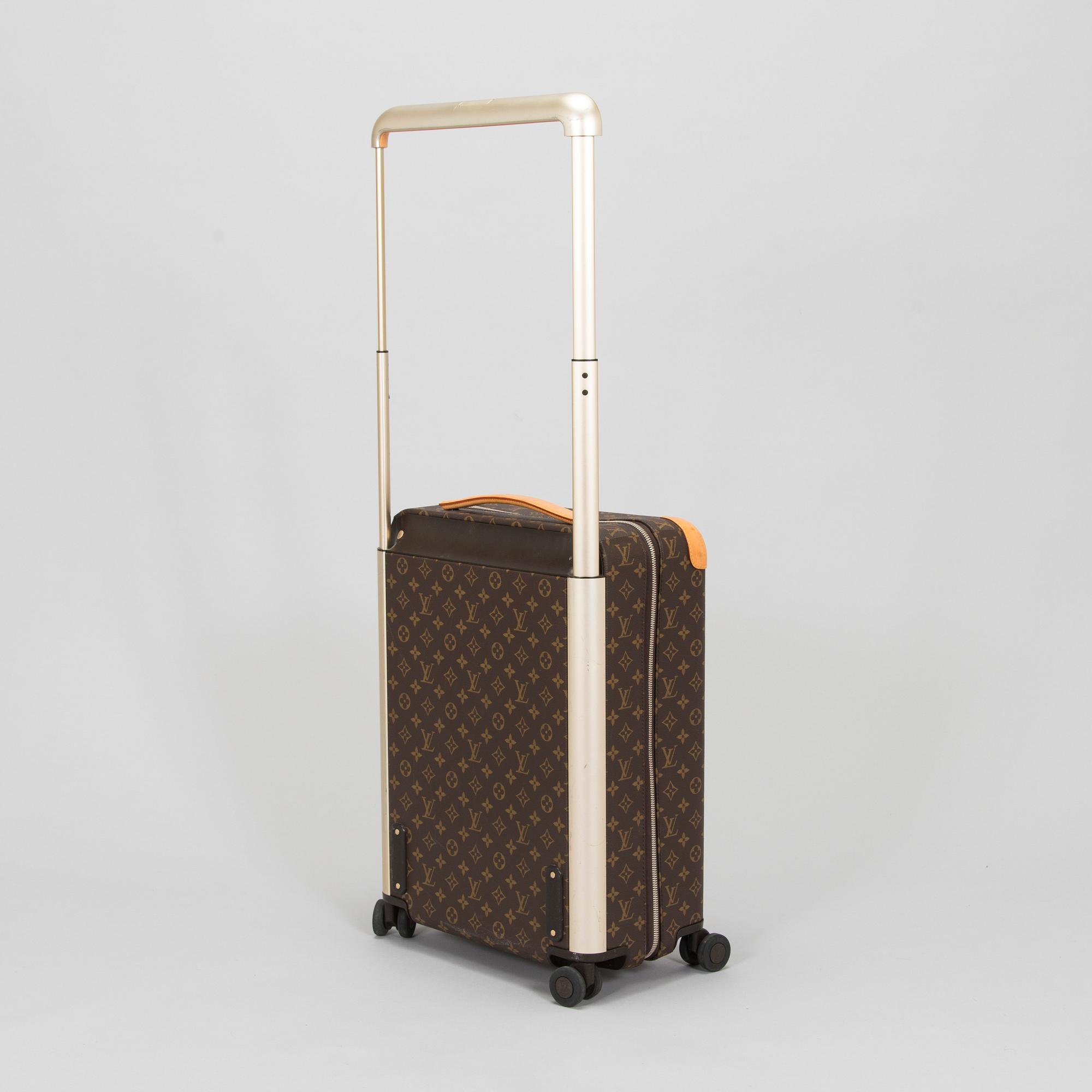 Louis Vuitton,  a 'Horizon 50' carry-on luggage bag.