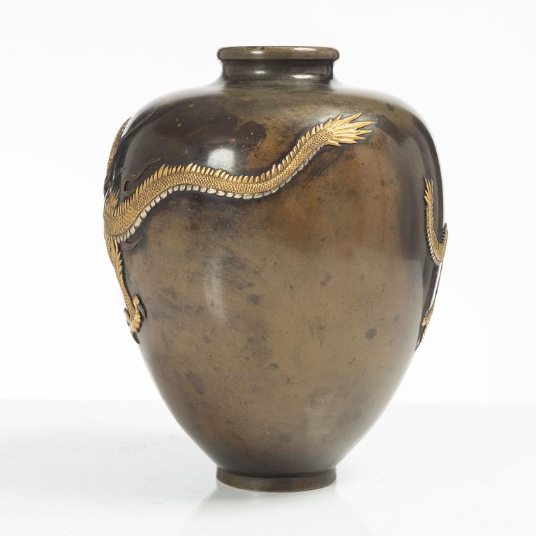 A Japanese gilt bronze and silvered dragon vase, Meiji period (1868-1912). Signed.
