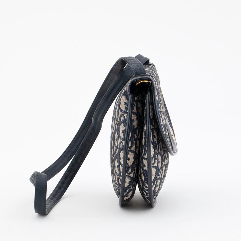 CHRISTIAN DIOR, a blue monogrammed canvas shoulder bag and belt.
