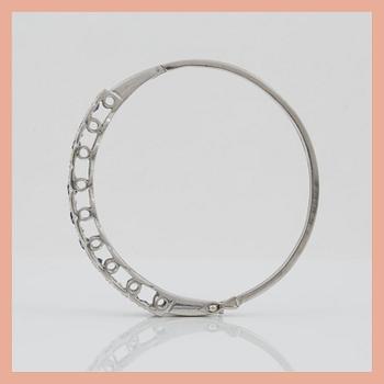 ARMBAND med safirer samt briljantslipade diamanter totalt ca 1.50 ct.