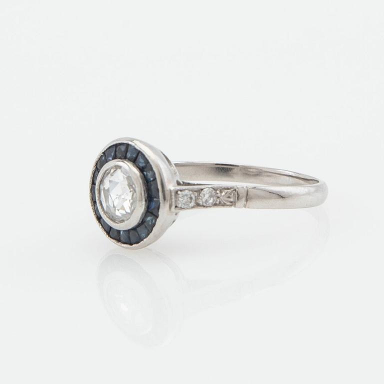Halo ring, platinum with rose-cut diamond and sapphires.