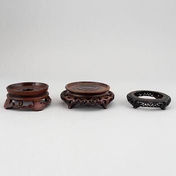 A group of Chinese wooden stands, 19th/20th Century. (13 pieces).