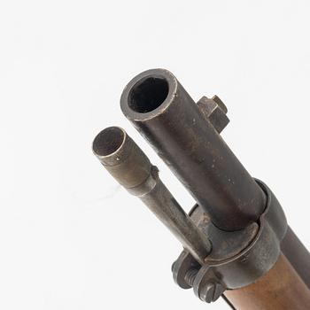 A Swedish 1860 pattern percussion rifle.