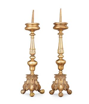 520. A pair of probably Flemish 17th century brass pricket candlesticks.