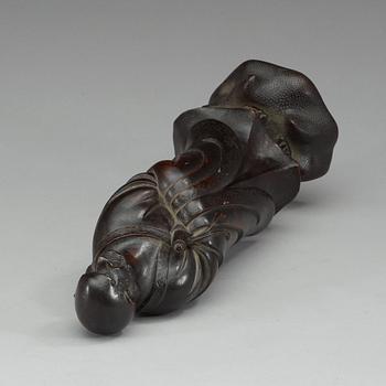 A bronze figure of one of the Lohans, Qing dynasty (1644-1912).