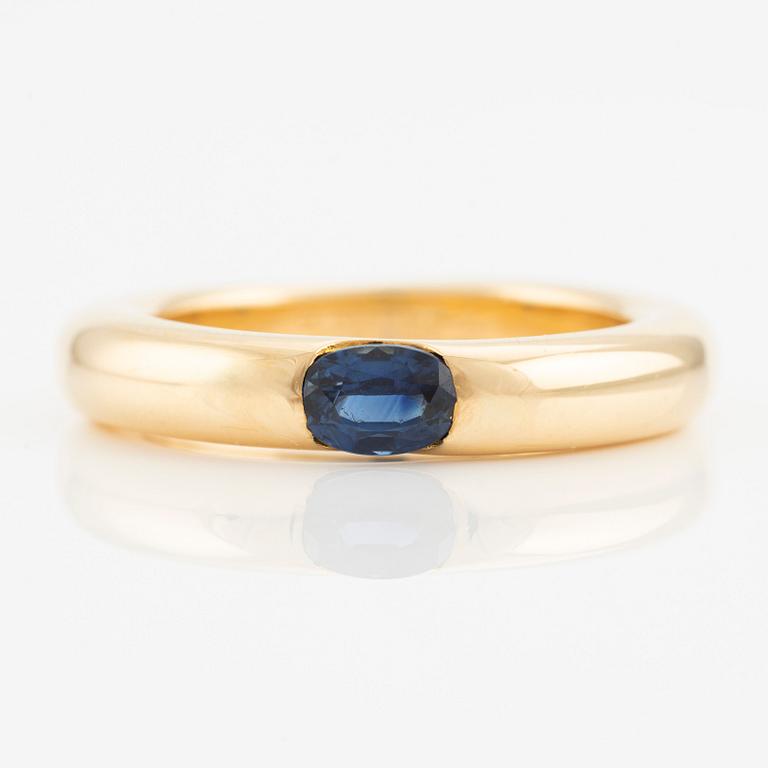 Cartier, ring, "Ellipse", 18K gold with faceted sapphire.