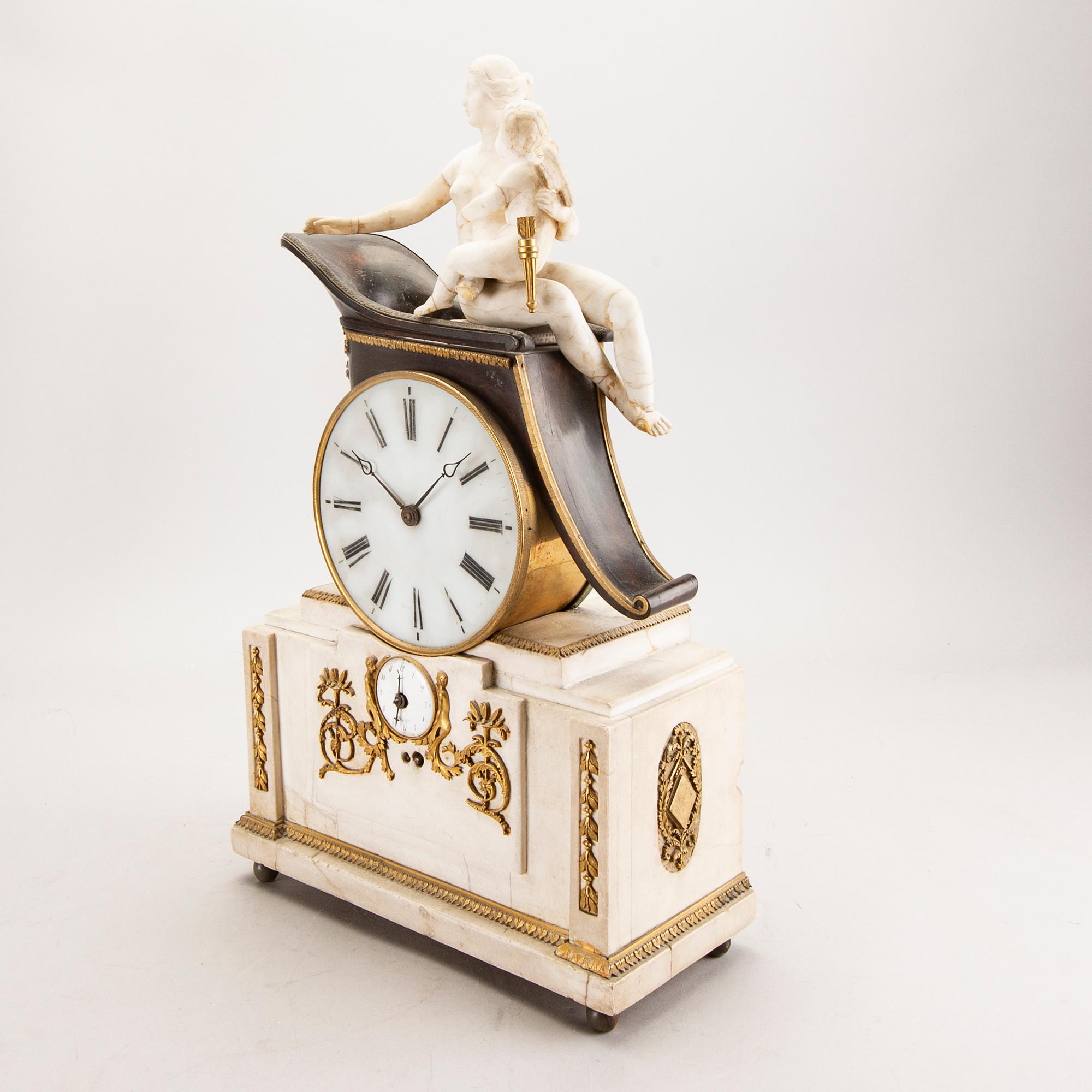 An Empire table clock first half of the 19th century.