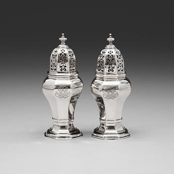 A matched pair of Swedish 18th century parcel-gilt sugar-casters, one marked Friedrich Heinrich Klinck, Stockholm 1733.