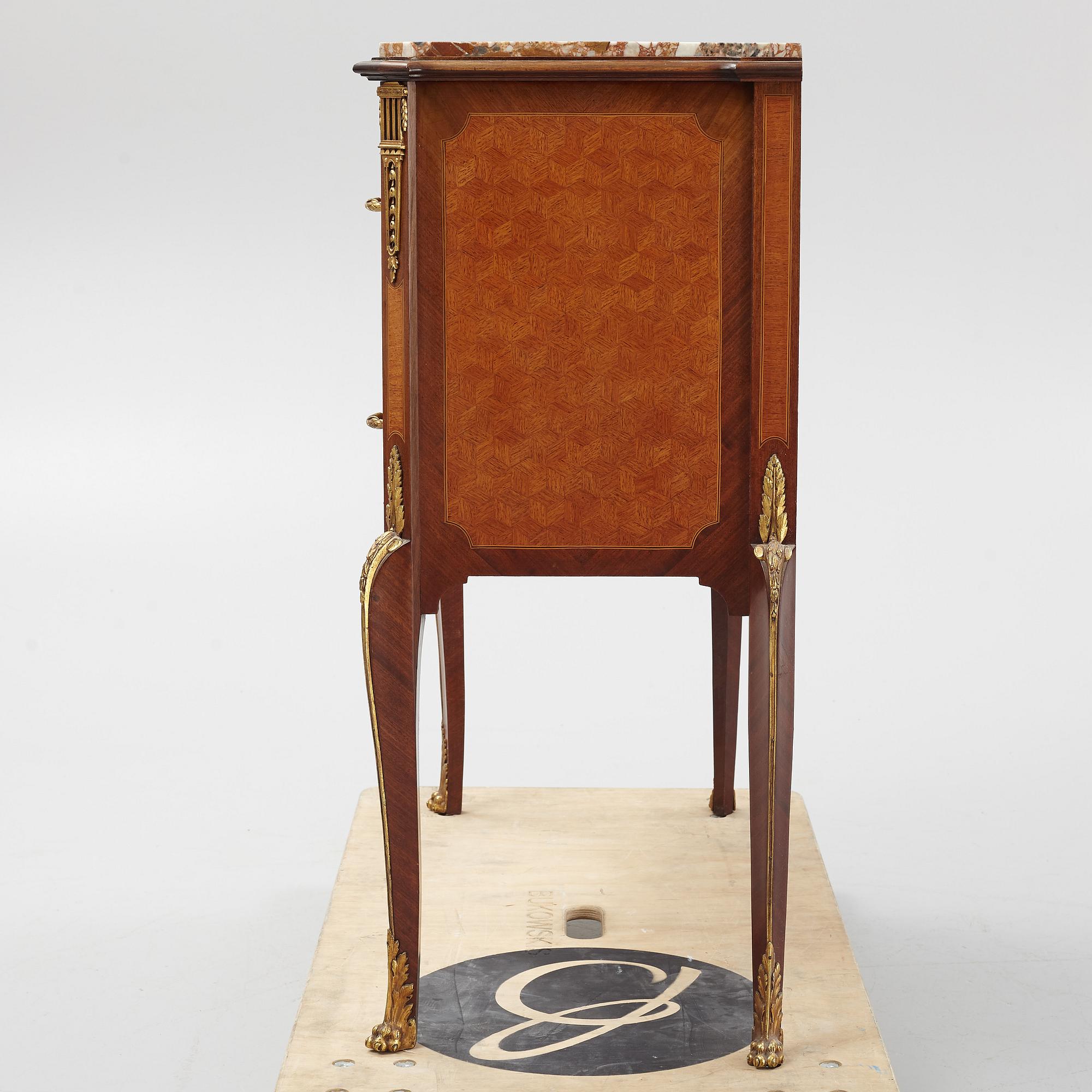 A Louis XVI-style bureau from the second half of the 20th century.