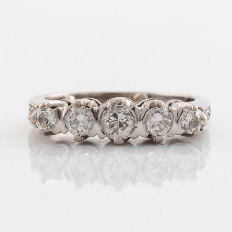 An 18K white gold ring set with round brilliant-and eight-cut diamonds.