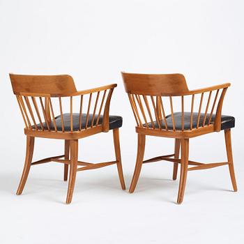 Josef Frank, a pair of mahogany and black leather 'Captain's chair', Svenskt Tenn, model 789B, acquired in 1950.