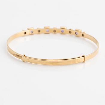 Armring, 18K guld med pärlor och ametister. Stockholm 1964.