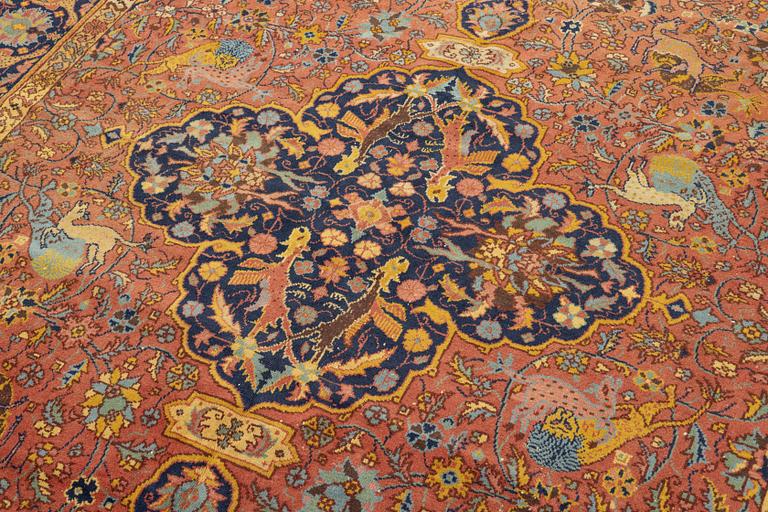 A carpet, antique/semi-antique Turkish/Indian, approx. 330 x 234 cm.