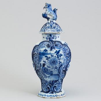 A lidded faience urn, Delft, The Netherlands, 18th century.