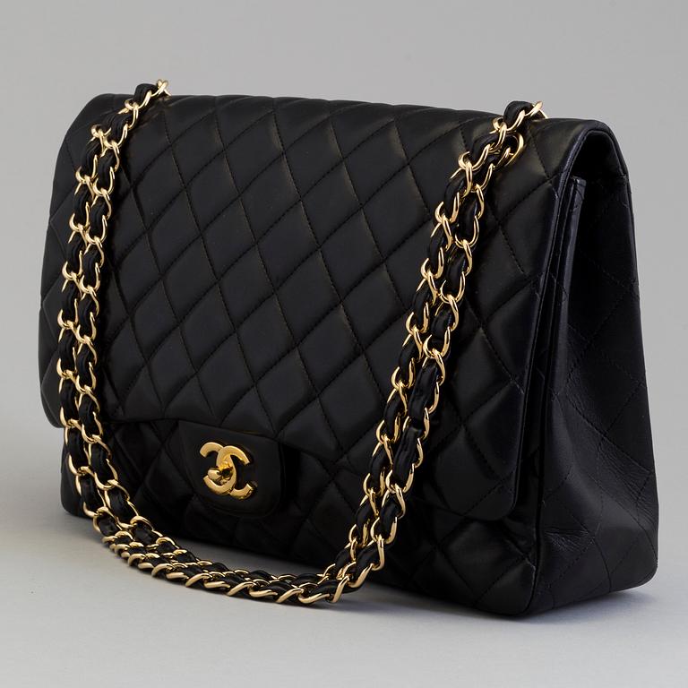 A "Double flap bag maxi" by Chanel 2009-10.