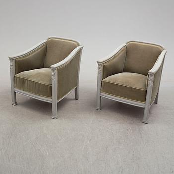 A pair of early 20th century easy chairs.