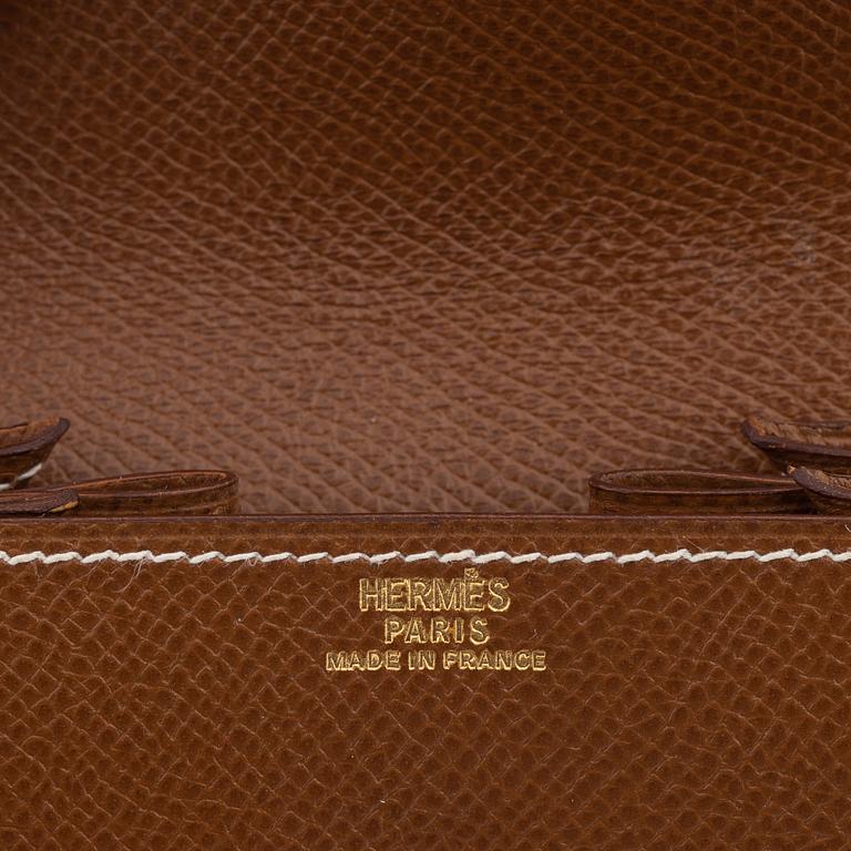 Hermès, a whisky epsom leather coin purse, 1993.